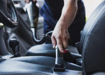 Whether you're looking for the best way to clean your car interior or remove stubborn stains from carpets and mats, there are plenty of car accessories available to help you get the job done quickly and easily. From vacuum cleaners to steam cleaners, brushes, and sponges, there's something for everyone when it comes to cleaning your car interior like a pro. We'll look at some of the most popular car accessories that will help you keep your car looking its best. With the right cars accessories and a little know-how, you can clean your car interior like a pro! There are plenty of products that can help you get the job done quickly and efficiently. We will explore some of these products and discuss how they can help you make your car look brand new in no time. regardless of whether you use your car to transport children, pets, people, or just yourself, keeping it spotless will keep both you and the people you're riding with happy. Additionally, dirt, dust, and grime can accumulate over time and degrade the interior components of your car, posing problems beyond just odd odors and unsightly stains. Are you prepared to begin? Allow us to assist you in cleaning the interior of your car to a showroom standard. This manual was created to help you properly care for the interior of your car. With these procedures, suggestions, and products, you can say goodbye to cracker crumbs and the soda that was spilled last month. What You Require You need to know what products to use in order to make the interior of your car cleaner compared to the day you drove it off the lot. While many everyday items can be reused to clean your car, you can also buy cleaners made specifically to deep clean your car while safeguarding its materials. Remember that some household cleaners may contain harsh chemicals that can gradually damage surfaces in your car. Avoiding or diluting these chemicals will protect your car from the degradation of leather, plastics, and fabric materials. Instead, we advise using goods and cleaners made especially to thoroughly clean your car while safeguarding its components. From A to B: Interior Car Detailing It's time to start after you've gathered your supplies. To thoroughly clean your car's corners and crevices, follow these steps: Assemble waste and debris Take everything out of the trunk and car, including the car seats and toys. All the garbage from the seat pockets, holders for beverages, door pockets, and floorboards should be collected and thrown away. Clean the floor mats by removing dust and dirt. In a car interior, floor mats are frequently among the dirtiest components. Give each mat a thorough shake or vacuum, then set it on a drop cloth or tarp rather than the unclean ground. Follow the directions and use a carpet or upholstery cleaner on carpeted mats. To remove extra soil from silicone, rubber, or vinyl mats, use a hose. In a bucket, combine warm water with a few drops of dish soap. After a thorough rinse, let them air dry. Windows and mirrors inside should be cleaned. An ammonia-free window cleaner is required, or you can create your own solution using a microfiber cloth. The removal of anti-glare or anti-fingerprint coatings by an ammonia-based cleaner can harm dashboard touchscreens or interior plastics. As you begin at the top of the window and work your way down, lowering the windows a little will allow you to catch any drips that may appear. Make sure the cleaning product is safe for your tinted windows by reading the instructions if you have them. Degrease the center console. A mess-prone set of cup holders is typically found in the center console. If the cup holder can be removed, put it in warm water with a few drops of dish soap to soak. With a sponge, scrub it clean. After thoroughly rinsing it with fresh water and wiping it down with a soft cloth, you're finished. The console should be dried before being put back together. In order to make the gearstick and other controls clean: Make use of a dry, barely damp microfiber cloth. Use an old toothbrush, or a wet cotton swab, or cover a damp towel around the tip of a blunt knife or flat-head screwdriver to access tight corners. Leather Car Seat Cleaning If your car seats are leather, carefully clean the stitching and the region where the backs and bottom seats meet by using the vacuum crevice tool. Clean each seat with an industrial leather cleaner designed for automotive use or a saddle soap and water solution. Some cleaning lines, like Lexol, are made specifically for cars, so the conditioners absorb in under 15 minutes, allowing you to resume driving. Consider applying a conditioner made of leather to the seat after cleaning it to bring back its suppleness and shine. Final Words: Cleaning the inside of your car can seem like a losing battle. Utilize the following advice to keep the interior of your car cleaner and safeguard it until your next thorough cleaning: Purchase car putty or gel and keep some on hand so that you can quickly clean vents and other difficult-to-reach areas. To lessen litter, buy a car trash bin or use a tiny bag to collect trash in your car. Purchase a silicone baking cup to line your cupholders with to lessen the amount of residue that accumulates. To keep travel necessities, snacks, and entertainment for children and other passengers, purchase an over-the-seat organizer.