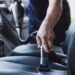 Whether you're looking for the best way to clean your car interior or remove stubborn stains from carpets and mats, there are plenty of car accessories available to help you get the job done quickly and easily. From vacuum cleaners to steam cleaners, brushes, and sponges, there's something for everyone when it comes to cleaning your car interior like a pro. We'll look at some of the most popular car accessories that will help you keep your car looking its best. With the right cars accessories and a little know-how, you can clean your car interior like a pro! There are plenty of products that can help you get the job done quickly and efficiently. We will explore some of these products and discuss how they can help you make your car look brand new in no time. regardless of whether you use your car to transport children, pets, people, or just yourself, keeping it spotless will keep both you and the people you're riding with happy. Additionally, dirt, dust, and grime can accumulate over time and degrade the interior components of your car, posing problems beyond just odd odors and unsightly stains. Are you prepared to begin? Allow us to assist you in cleaning the interior of your car to a showroom standard. This manual was created to help you properly care for the interior of your car. With these procedures, suggestions, and products, you can say goodbye to cracker crumbs and the soda that was spilled last month. What You Require You need to know what products to use in order to make the interior of your car cleaner compared to the day you drove it off the lot. While many everyday items can be reused to clean your car, you can also buy cleaners made specifically to deep clean your car while safeguarding its materials. Remember that some household cleaners may contain harsh chemicals that can gradually damage surfaces in your car. Avoiding or diluting these chemicals will protect your car from the degradation of leather, plastics, and fabric materials. Instead, we advise using goods and cleaners made especially to thoroughly clean your car while safeguarding its components. From A to B: Interior Car Detailing It's time to start after you've gathered your supplies. To thoroughly clean your car's corners and crevices, follow these steps: Assemble waste and debris Take everything out of the trunk and car, including the car seats and toys. All the garbage from the seat pockets, holders for beverages, door pockets, and floorboards should be collected and thrown away. Clean the floor mats by removing dust and dirt. In a car interior, floor mats are frequently among the dirtiest components. Give each mat a thorough shake or vacuum, then set it on a drop cloth or tarp rather than the unclean ground. Follow the directions and use a carpet or upholstery cleaner on carpeted mats. To remove extra soil from silicone, rubber, or vinyl mats, use a hose. In a bucket, combine warm water with a few drops of dish soap. After a thorough rinse, let them air dry. Windows and mirrors inside should be cleaned. An ammonia-free window cleaner is required, or you can create your own solution using a microfiber cloth. The removal of anti-glare or anti-fingerprint coatings by an ammonia-based cleaner can harm dashboard touchscreens or interior plastics. As you begin at the top of the window and work your way down, lowering the windows a little will allow you to catch any drips that may appear. Make sure the cleaning product is safe for your tinted windows by reading the instructions if you have them. Degrease the center console. A mess-prone set of cup holders is typically found in the center console. If the cup holder can be removed, put it in warm water with a few drops of dish soap to soak. With a sponge, scrub it clean. After thoroughly rinsing it with fresh water and wiping it down with a soft cloth, you're finished. The console should be dried before being put back together. In order to make the gearstick and other controls clean: Make use of a dry, barely damp microfiber cloth. Use an old toothbrush, or a wet cotton swab, or cover a damp towel around the tip of a blunt knife or flat-head screwdriver to access tight corners. Leather Car Seat Cleaning If your car seats are leather, carefully clean the stitching and the region where the backs and bottom seats meet by using the vacuum crevice tool. Clean each seat with an industrial leather cleaner designed for automotive use or a saddle soap and water solution. Some cleaning lines, like Lexol, are made specifically for cars, so the conditioners absorb in under 15 minutes, allowing you to resume driving. Consider applying a conditioner made of leather to the seat after cleaning it to bring back its suppleness and shine. Final Words: Cleaning the inside of your car can seem like a losing battle. Utilize the following advice to keep the interior of your car cleaner and safeguard it until your next thorough cleaning: Purchase car putty or gel and keep some on hand so that you can quickly clean vents and other difficult-to-reach areas. To lessen litter, buy a car trash bin or use a tiny bag to collect trash in your car. Purchase a silicone baking cup to line your cupholders with to lessen the amount of residue that accumulates. To keep travel necessities, snacks, and entertainment for children and other passengers, purchase an over-the-seat organizer.